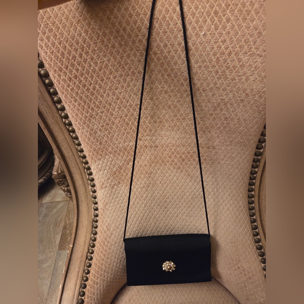 Elegant Black Clutch with Gold Accent - Picture 2 of 7